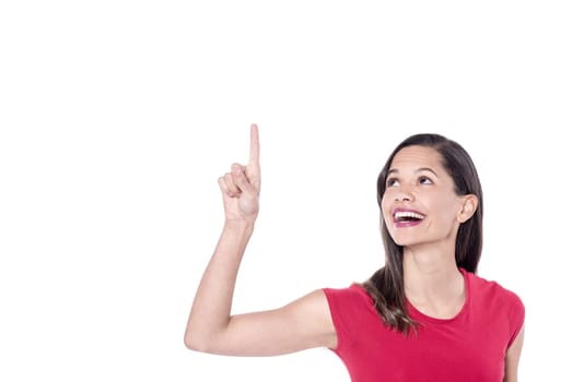 Smiling looking and pointing upwards against a white background