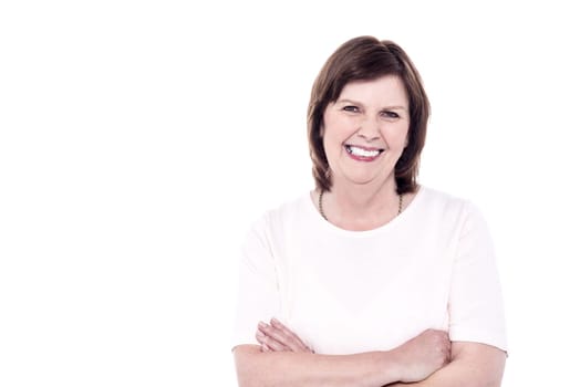 Picture of confident senior woman with arms folded