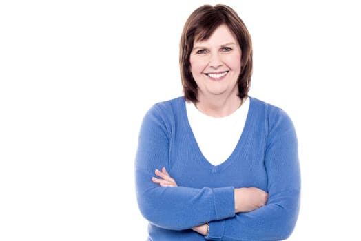 Happy smiling retired senior woman looking at camera