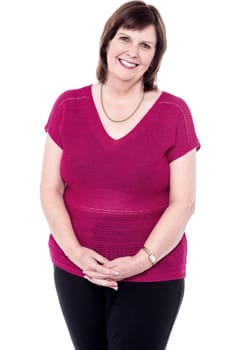 Elder woman posing to camera with cute smile