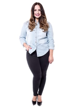 Fashion model standing over a white background