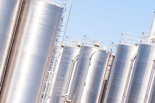 Detail of chemical plant, silos and pipes