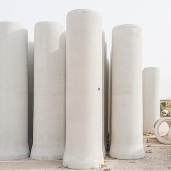 Concrete drainage pipes for industrial building construction.