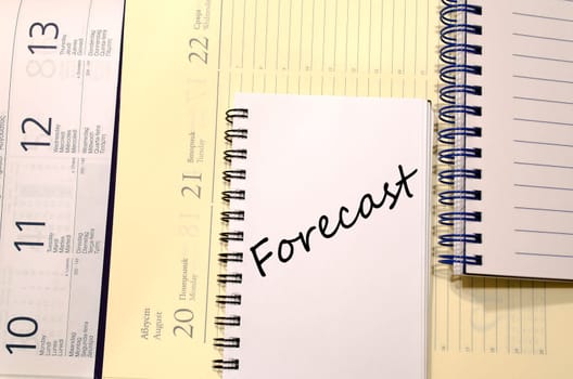 Forecast text concept write on notebook