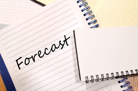 Forecast text concept write on notebook