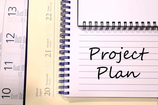 Project plan text concept write on notebook