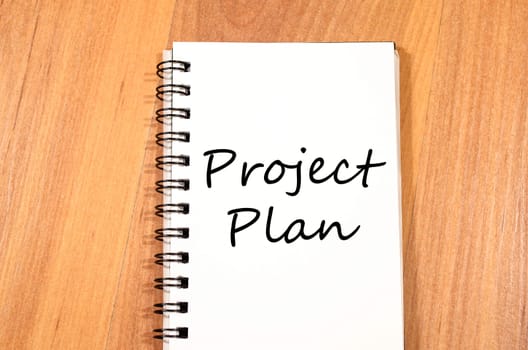 Project plan text concept write on notebook
