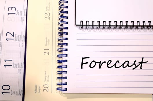 Forecast text concept write on notebook