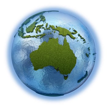 Australia on 3D model of planet Earth with grassy continents with embossed countries and blue ocean. 3D illustration isolated on white background.