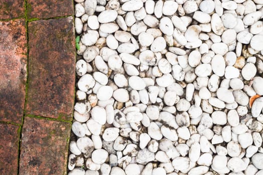 Pebble stones and bricks abstract background, stock photo