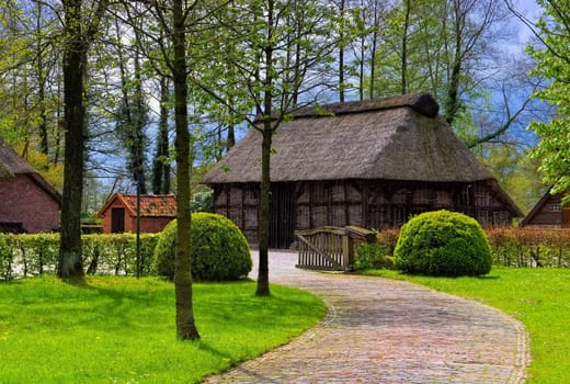 Neuchatel Park in East Frisia- Neuchatel Park with old houses in East Frisians