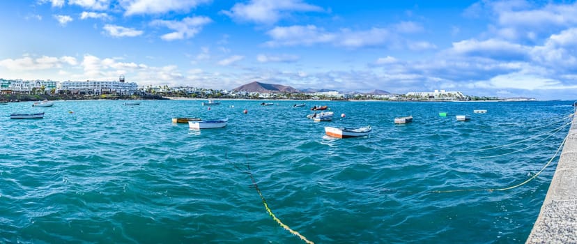 Costa Teguise,boats in the blue waters off the coast of Lanzarote