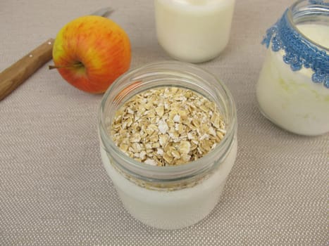 Yoghurt in the glass from the yoghurt maker with oatmeal