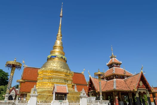 Ancient Buddhist temple of Wat Pongsanuk in Lampang,Thailand. The mix of Lanna and Burmese architectural and decorative styles