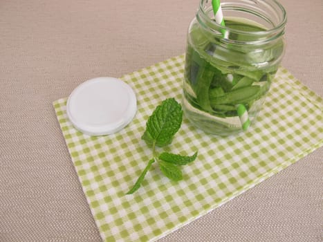 Detox water with cucumber zest and mint