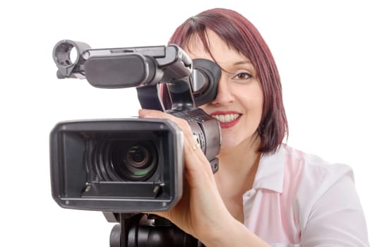 a pretty camerawoman with a professional camera, on white