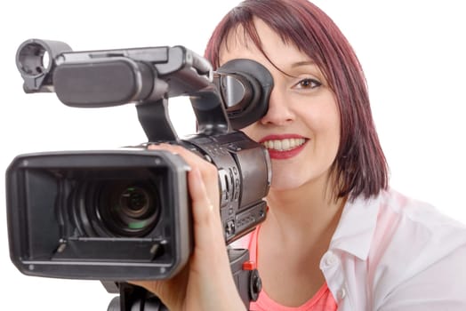 a pretty camerawoman with a professional camera, on white