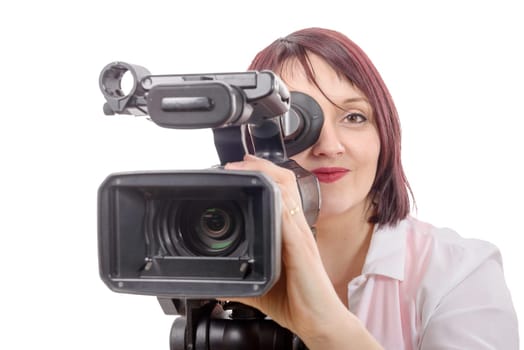 a pretty camerawoman with a professional camera, on white