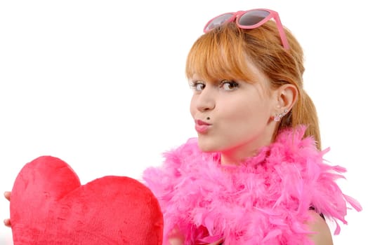 a young beautiful woman with big red heart pillow