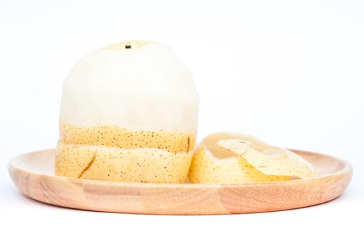 Peeled Chinese pear on white background, stock photo