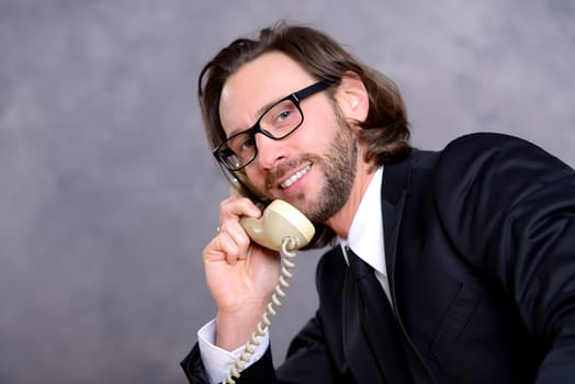 young businessman has a good phone call