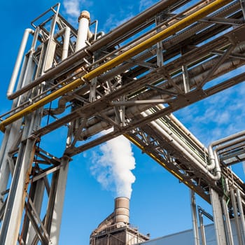 Chemical plant for the treatment of chipboard for furniture factory,with chimney
