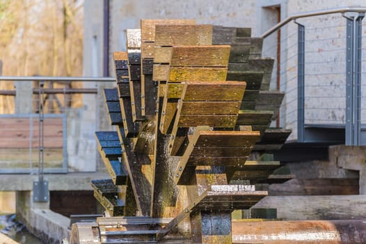 Series of three wheeled wooden mill renovated