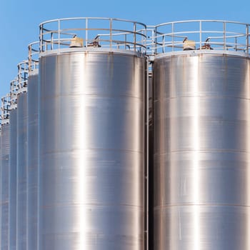 Detail of chemical plant, silos and pipes
