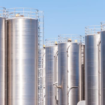 Detail of chemical plant, silos and pipes