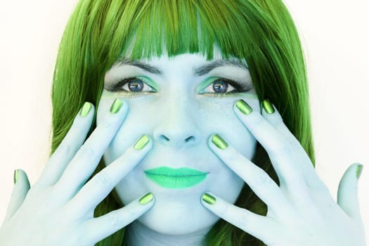 The woman with the green hair and the green makeup