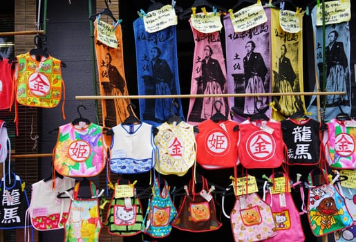KOCHI, JAPAN- April 24: Daily Souvenir market on Kochi-Nichiyoichi (Otesuji-street), merchant display apron and towel for sale on April 24,2016, the Japan.