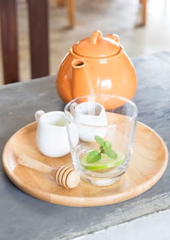 Hot pot of honey lime healthy drink, stock photo