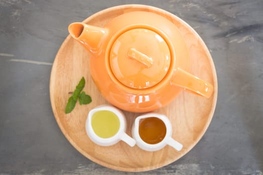 Hot pot of honey lime healthy drink, stock photo