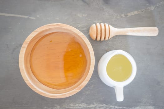 Golden honey cup and lime juice on top view, stock photo