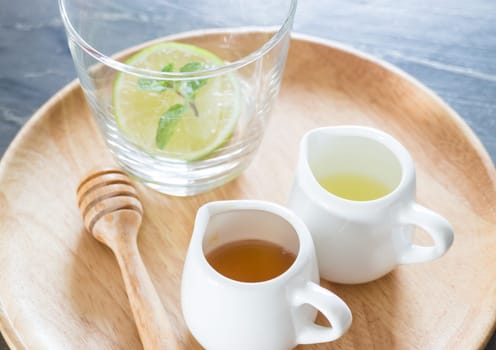 Cup of honey lime healthy drink, stock photo