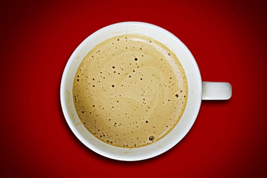 Coffee cup on a red background.