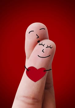 Happy couple in love with kiss and hugging