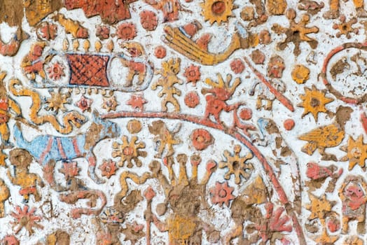 Details of a colorful ancient mural in the Huaca de la Luna in Trujillo, Peru