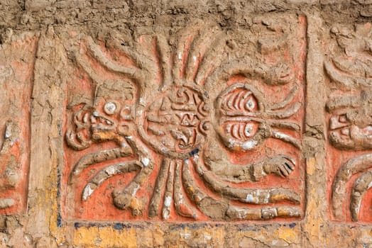 Closeup of a an ancient mural of a spider in the Huaca de la Luna in Trujillo, Peru