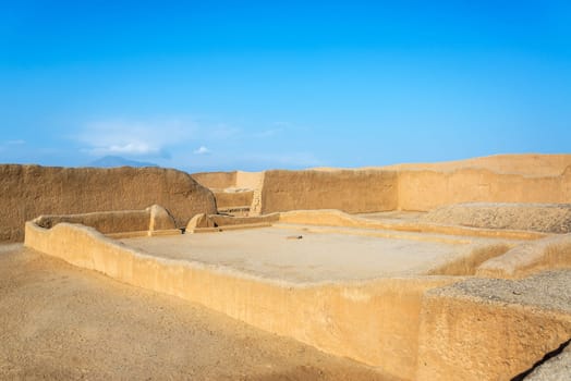 Ancient adobe ruins of a plaza in Chan Chan in Trujillo, Peru