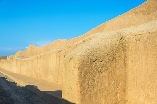 Large adobe wall in the ruins of Chan Chan in Trujillo, Peru