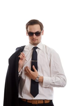 Fancy dressed man holding his jacket over his shoulder