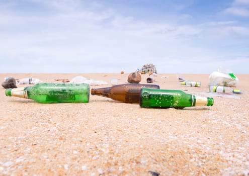 bottles and garbage waste on the beach