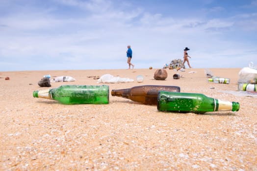 bottles and garbage waste on the beach