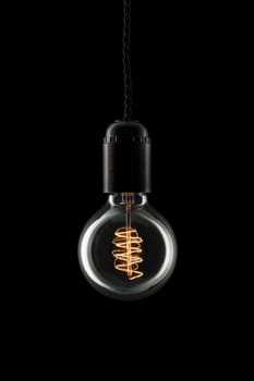 Glowing vintage style lightbulb turned on