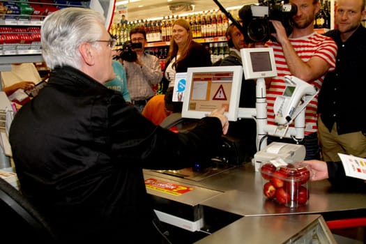 Sky du Mont at the request round-up action at Netto for disadvantaged children