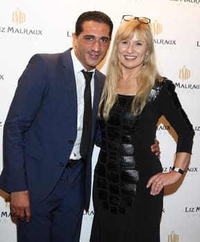 Ismail Oezen and Liz Malraux at Liz Malraux's fashion show in Hamburg