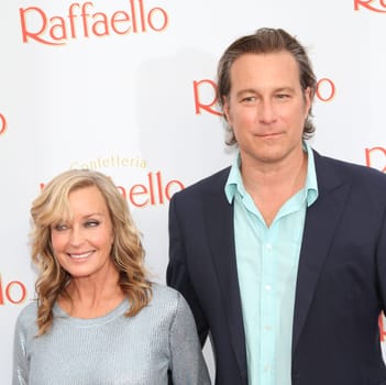 Bo Derek and John Corbett