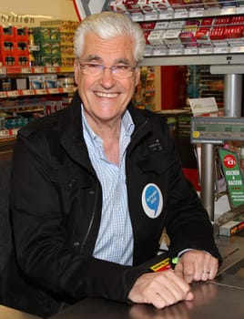 Sky du Mont at the request round-up action at REWE for disadvantaged children