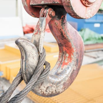 A close up of the hook on a crane.